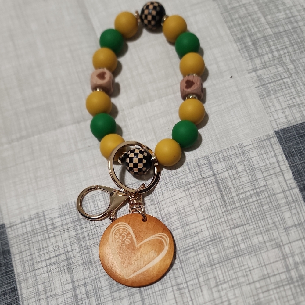Green and Yellow Silicone And Wood Beaded Bracelet with Heart Mama Charm